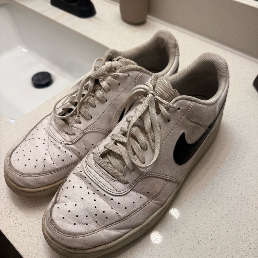 Nike Men's Off-White Sneakers with Black Swoosh